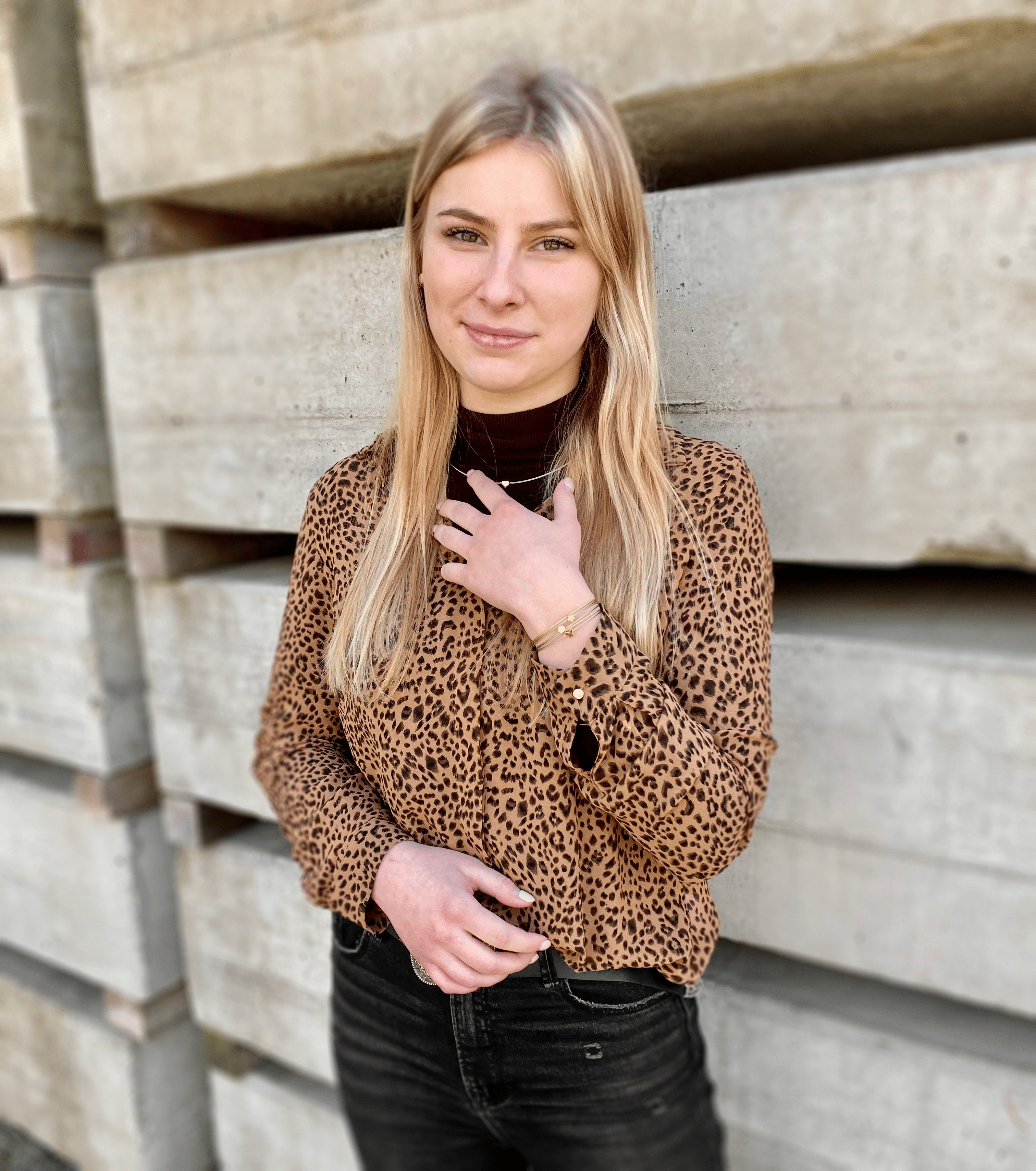 Woman wearing Thinking of You bracelet with gold-tone butterfly charm | CLIC by Suzanne